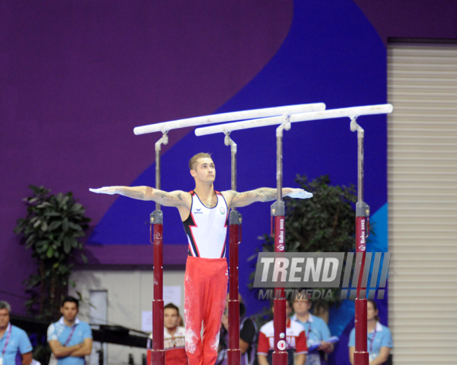 Azərbaycan gimnastı Oleq Stepko Avropa Oyunlarında paralel qollarda hərəkətlərdə qızıl medal qazandı. Bakı, Azərbaycan, 20 iyun 2015